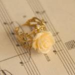 Cream orange resin rose flo..