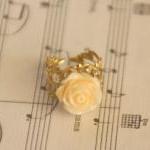 Cream orange resin rose flo..
